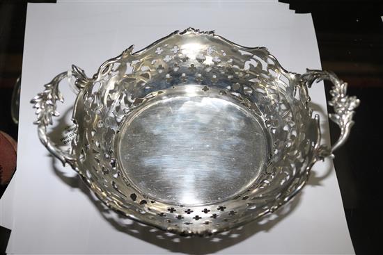 An antique Dutch? pierced silver two handled dish, 15 oz.